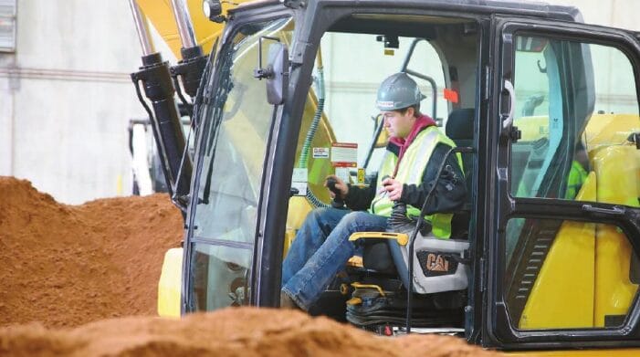 excavator with men