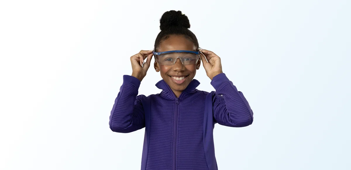 girl smiling with glasses