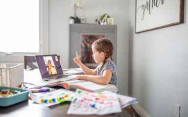 Elementary student attending to an online class at home